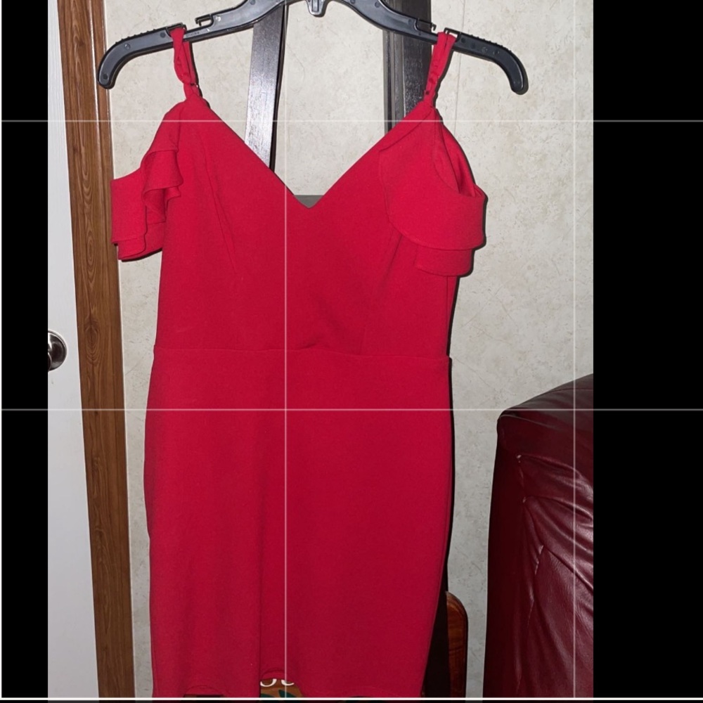 red dress with ruffled shoulder